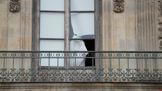 Paris, October 19, 2025: French police crime scene technicians work to gather evidence around  the window thieves broke to enter the Apollo Gallery in the Louvre to steal the Crown Jewels. Credit: Phil Pasquini / Shutterstock